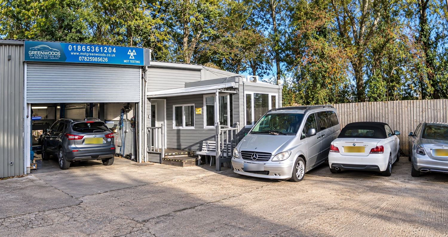 The Greenwoods yard in Garsington: MOT bay, reception office and cars